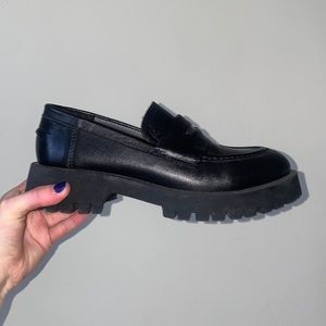 Black loafers. Size 38.